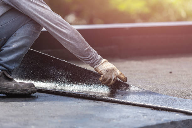 Professional Basement Waterproofing technician working in Briceville, TN